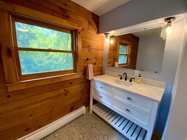 186 Hoosac Rd, Conway, MA 01341 - bathroom featuring wooden walls, vanity, and a baseboard heating unit