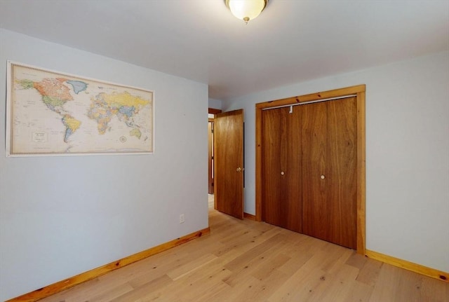 186 Hoosac Rd, Conway, MA 01341 - unfurnished bedroom with light wood-type flooring, a closet, and baseboards