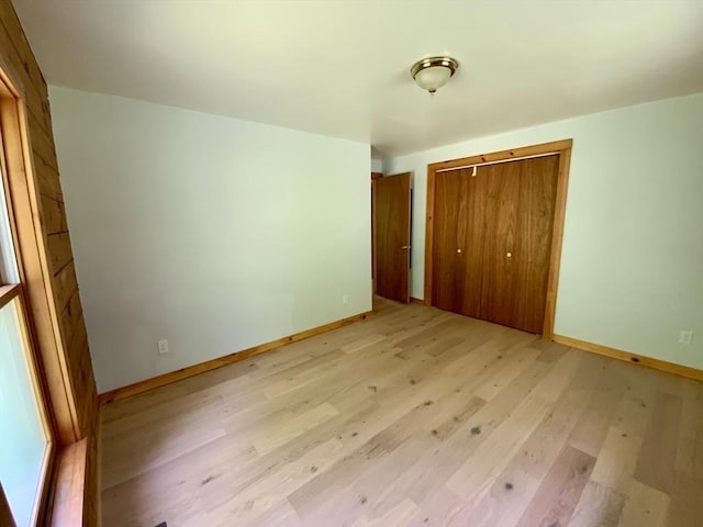186 Hoosac Rd, Conway, MA 01341 - unfurnished bedroom featuring light wood finished floors, a closet, and baseboards