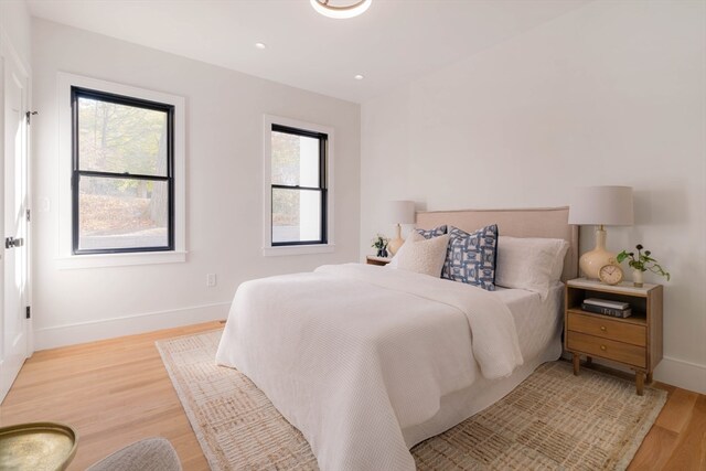 bedroom featuring light wood-type flooring