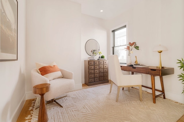 office space featuring light wood-type flooring