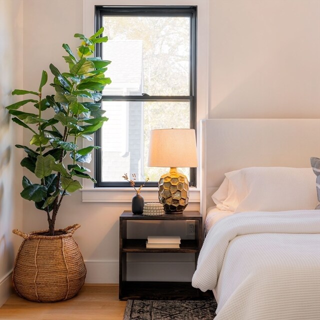 bedroom featuring hardwood / wood-style floors