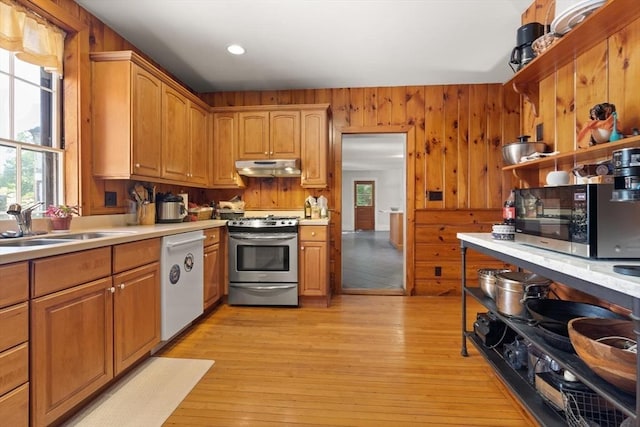 21 College Hill Rd, Somerville, MA 02144 - kitchen featuring stainless steel stove, dishwasher, plenty of natural light, under cabinet range hood, and recessed lighting