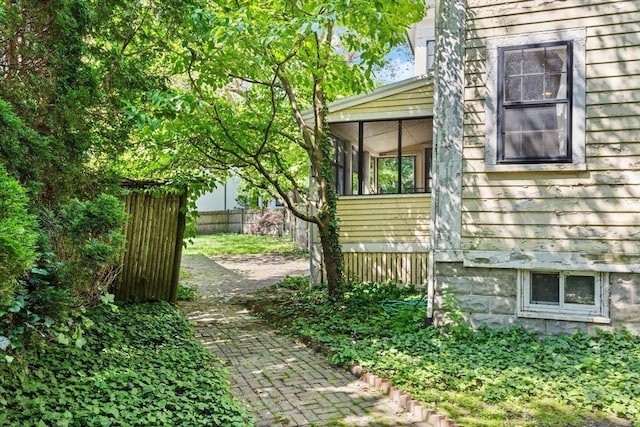 21 College Hill Rd, Somerville, MA 02144 - view of property exterior with a sunroom