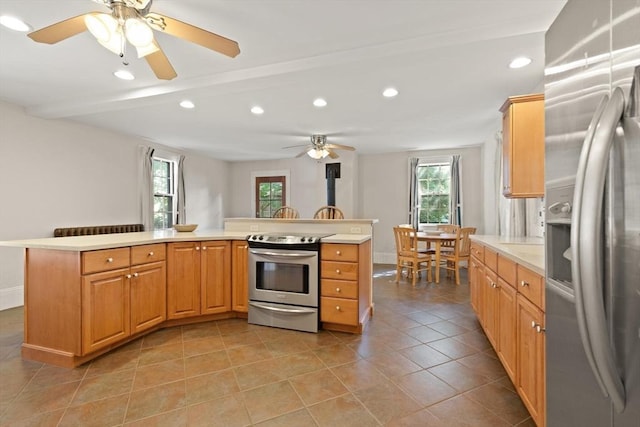 21 College Hill Rd, Somerville, MA 02144 - kitchen featuring stainless steel appliances, a ceiling fan, recessed lighting, plenty of natural light, and light countertops