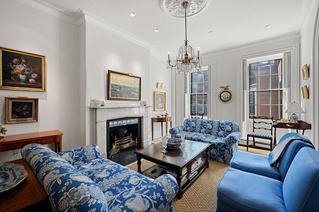 living room with a chandelier, a premium fireplace, ornamental molding, wood finished floors, and recessed lighting