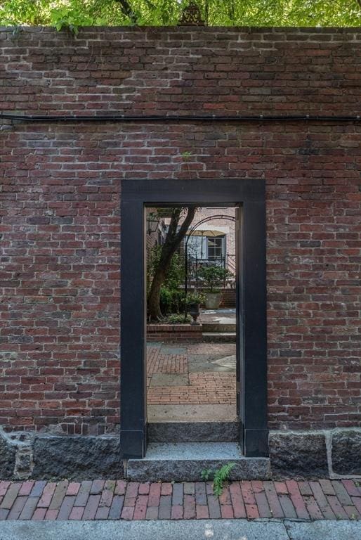 32 W Cedar St, Boston, MA 02108 - entrance to property with brick siding