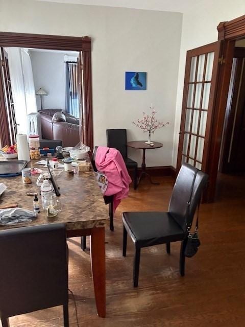 1117 Middlesex St, Lowell, MA 01851 - dining space with wood finished floors and baseboards