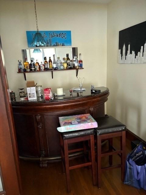 1117 Middlesex St, Lowell, MA 01851 - indoor dry bar featuring wood finished floors