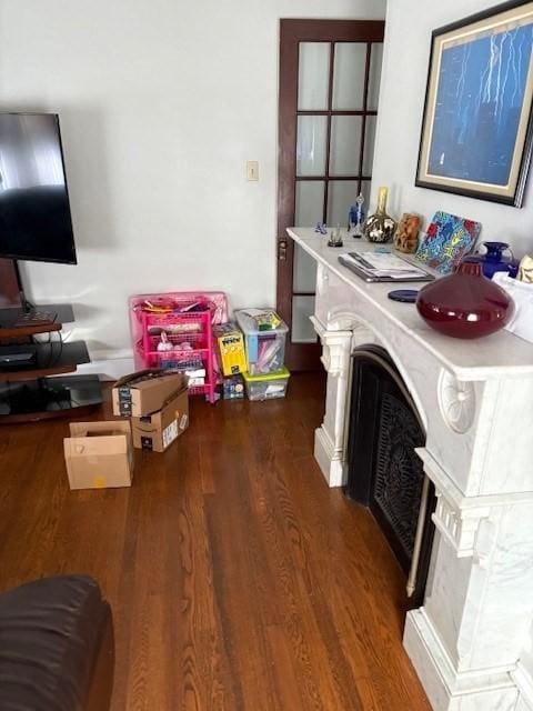 1117 Middlesex St, Lowell, MA 01851 - living area featuring wood finished floors and a fireplace