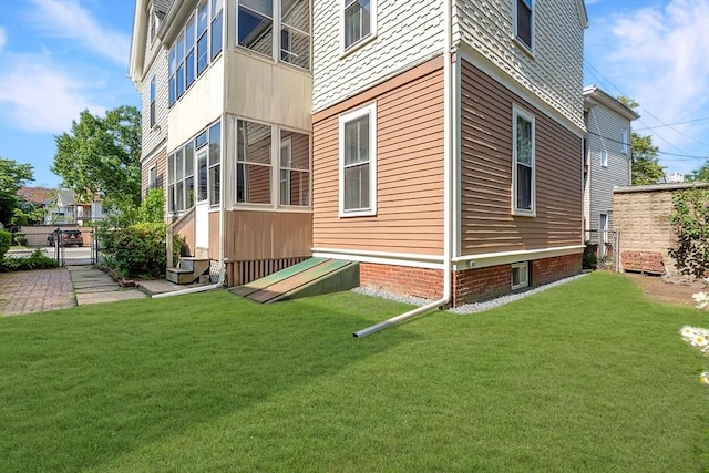 57 Rindge Ave, Cambridge, MA 02140 - view of home's exterior with entry steps and a gate