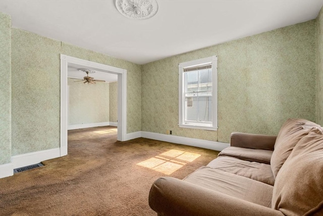57 Rindge Ave, Cambridge, MA 02140 - living area with carpet and baseboards