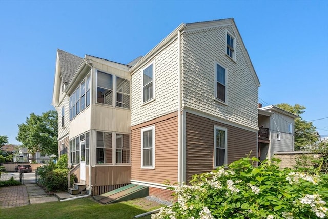 57 Rindge Ave, Cambridge, MA 02140 - back of house featuring entry steps and a gate