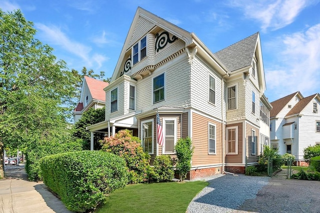 57 Rindge Ave, Cambridge, MA 02140 - view of home's exterior featuring a gate and a yard