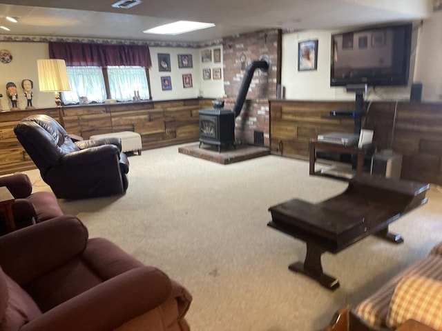 20 Colby Rd, Bridgewater, MA 02324 - carpeted living area featuring a wood stove