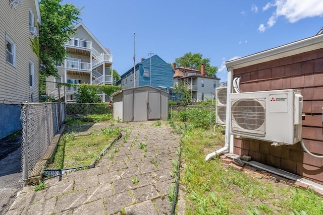 39 Mount Pleasant St, Somerville, MA 02145 - fenced backyard featuring a storage unit