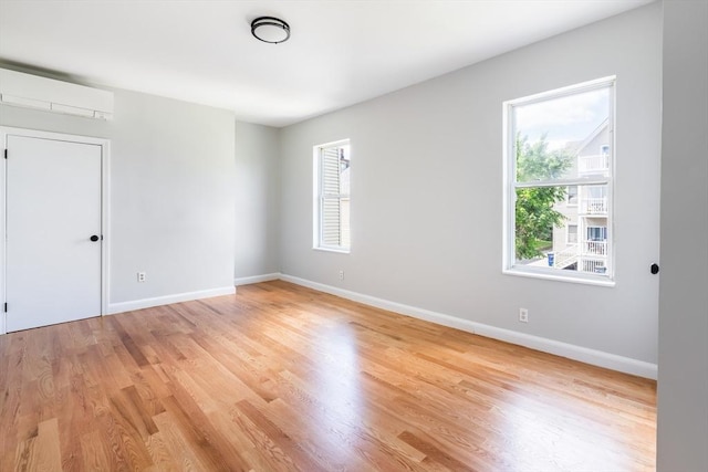 39 Mount Pleasant St, Somerville, MA 02145 - empty room with healthy amount of natural light and light wood-type flooring