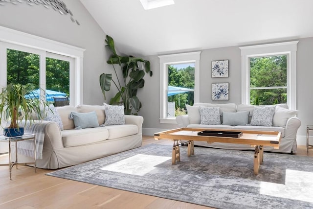 33 Pine Hill Rd, Newburyport, MA 01950 - living area with plenty of natural light, lofted ceiling, and wood finished floors