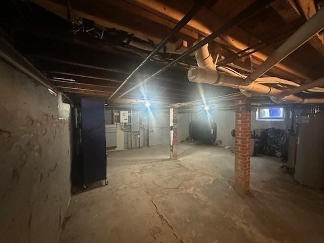 basement featuring heating unit and heating fuel