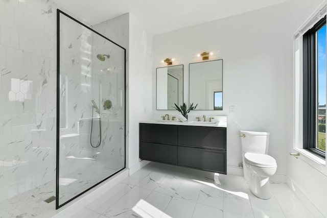 bathroom with vanity, an enclosed shower, and toilet