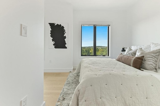 bedroom featuring light hardwood / wood-style flooring