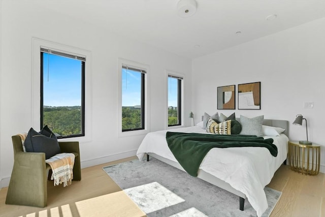 bedroom featuring light hardwood / wood-style floors