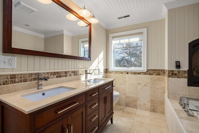 full bathroom featuring toilet, tile patterned flooring, visible vents, and a sink