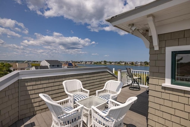 view of patio / terrace with a water view