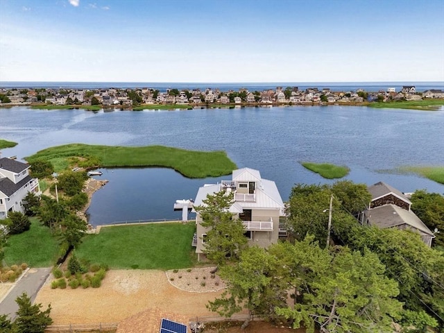 drone / aerial view with a water view