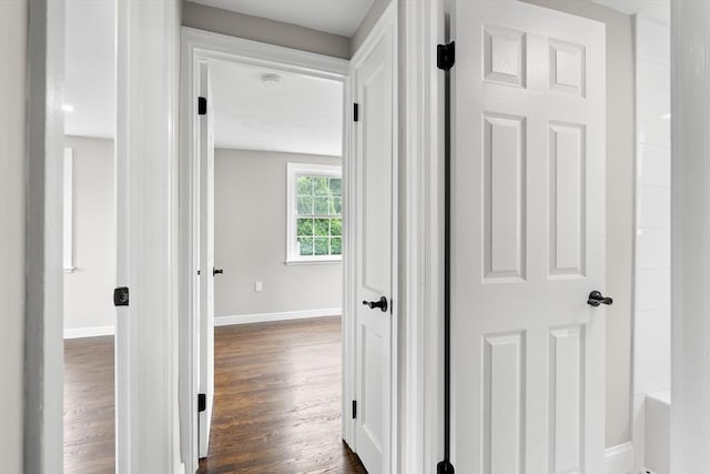 9 Bishop Rd, Quincy, MA 02170 - hall with baseboards and dark wood-style floors