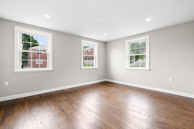 9 Bishop Rd, Quincy, MA 02170 - spare room with healthy amount of natural light, baseboards, wood finished floors, and recessed lighting