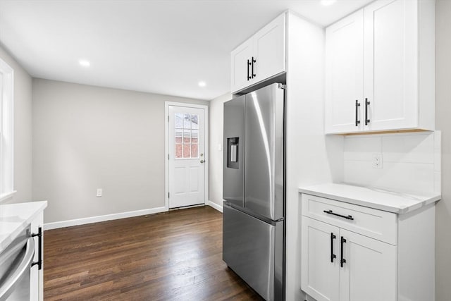 9 Bishop Rd, Quincy, MA 02170 - kitchen with stainless steel refrigerator with ice dispenser, dark wood-style flooring, white cabinets, baseboards, and recessed lighting