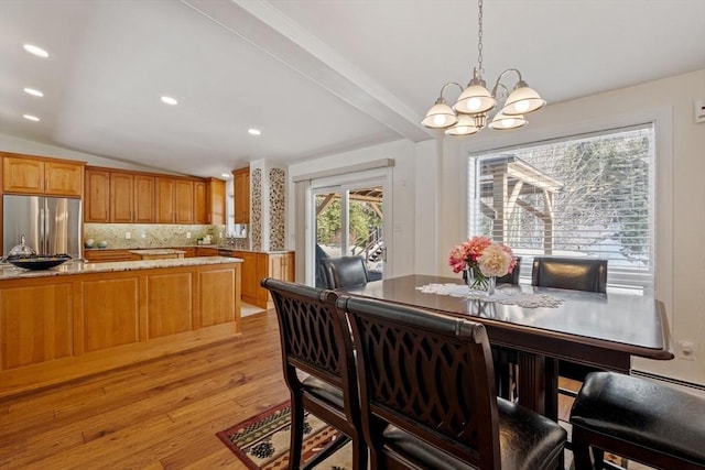 113 Glen Rd, Gorham, NH 03581 - dining area featuring lofted ceiling, a chandelier, light wood-style floors, and recessed lighting