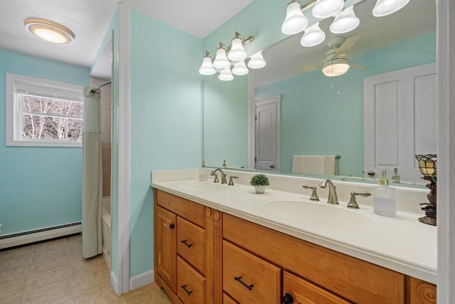 113 Glen Rd, Gorham, NH 03581 - full bathroom featuring double vanity, ceiling fan, tile patterned floors, shower / bath combo with shower curtain, and a baseboard heating unit
