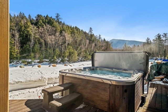 113 Glen Rd, Gorham, NH 03581 - wooden deck with a hot tub, a mountain view, and a wooded view