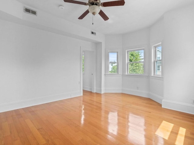 58 Oliver St Unit 2, Somerville, MA 02145 - unfurnished room with light wood-type flooring, ceiling fan, and baseboards