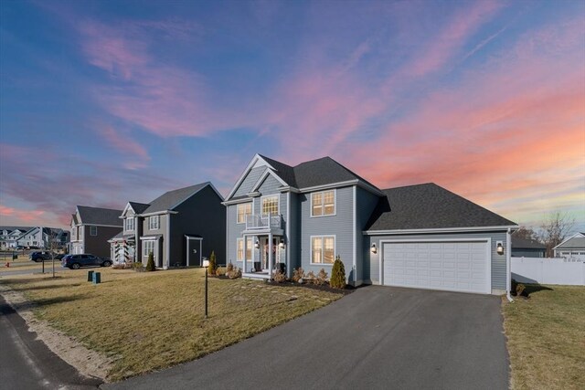 11 Wedge Dr, Lakeville, MA 02347 - view of front of house featuring asphalt driveway, a garage, and a balcony