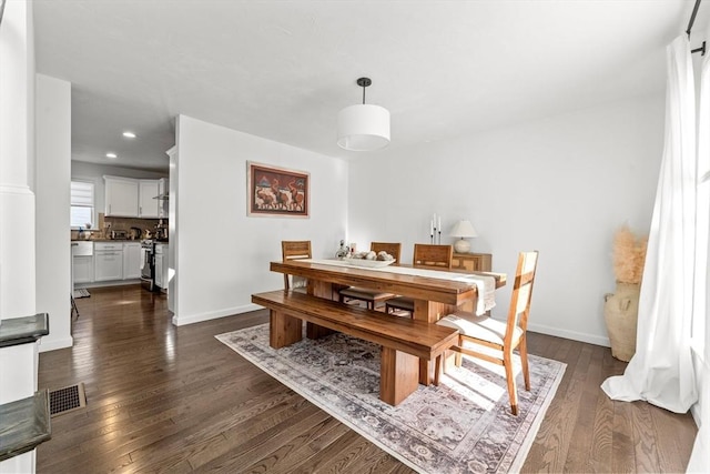 11 Wedge Dr, Lakeville, MA 02347 - dining space with dark wood finished floors, baseboards, and recessed lighting