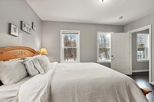 bedroom with hardwood / wood-style floors