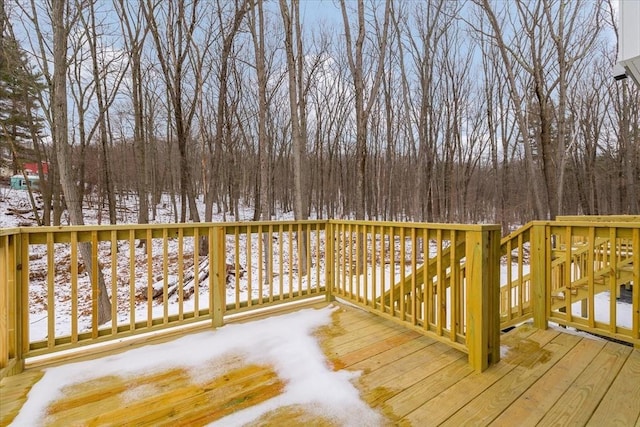 view of snow covered deck