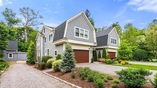 323 Lake Ave Unit 323, Newton, MA 02461 - colonial inspired home with a gambrel roof, asphalt driveway, and a garage