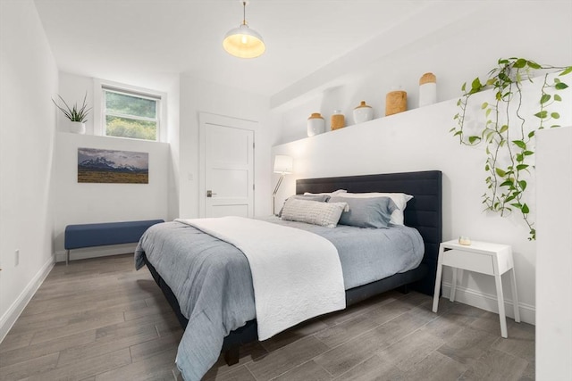 323 Lake Ave Unit 323, Newton, MA 02461 - bedroom with baseboards and wood finished floors