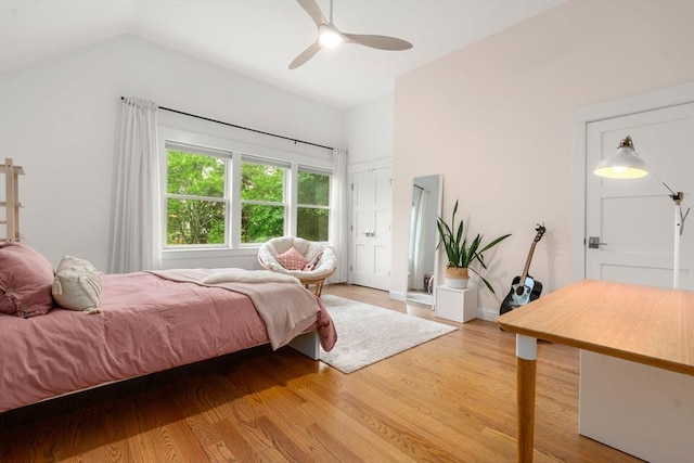 323 Lake Ave Unit 323, Newton, MA 02461 - bedroom with vaulted ceiling, light wood finished floors, and ceiling fan