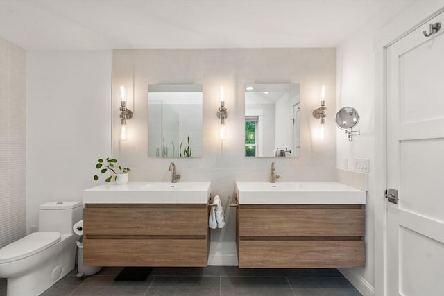 323 Lake Ave Unit 323, Newton, MA 02461 - bathroom with two vanities, toilet, and tile patterned flooring