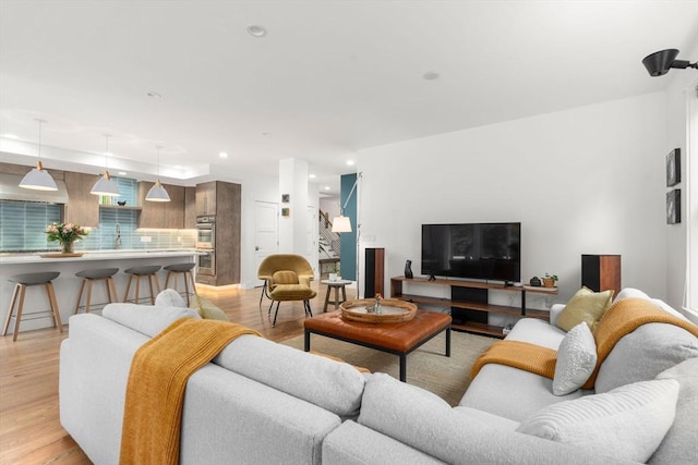 323 Lake Ave Unit 323, Newton, MA 02461 - living area featuring light wood-style flooring and recessed lighting