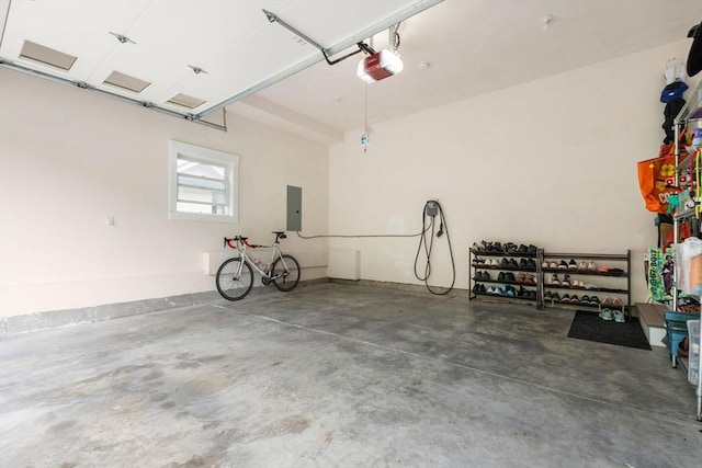 323 Lake Ave Unit 323, Newton, MA 02461 - garage with a garage door opener and electric panel