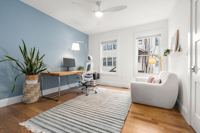 323 Lake Ave Unit 323, Newton, MA 02461 - home office featuring a ceiling fan, baseboards, and wood finished floors