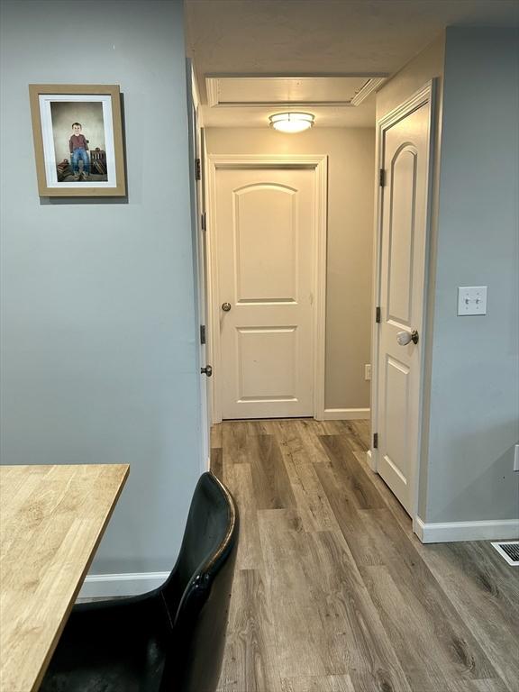 1 Sunderland Ter, Worcester, MA 01604 - hall featuring wood finished floors and baseboards