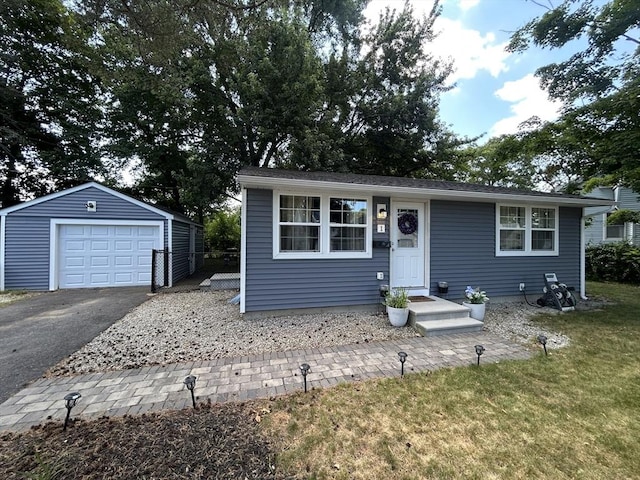 1 Sunderland Ter, Worcester, MA 01604 - view of front of house with an outbuilding, a garage, driveway, and a front yard