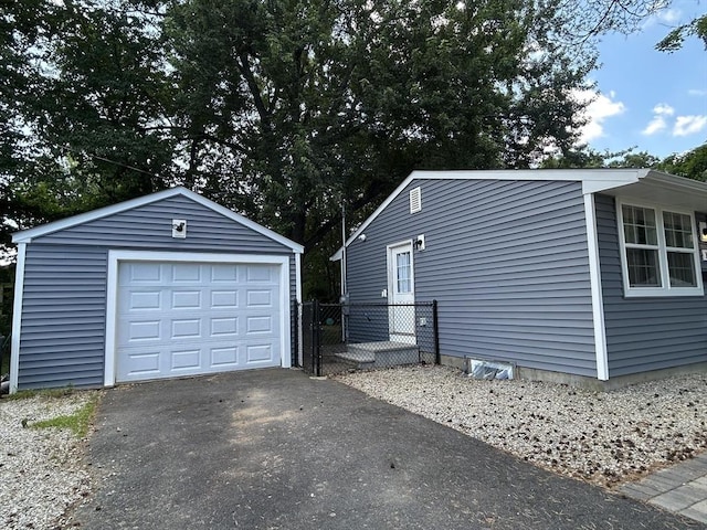 1 Sunderland Ter, Worcester, MA 01604 - detached garage featuring asphalt driveway